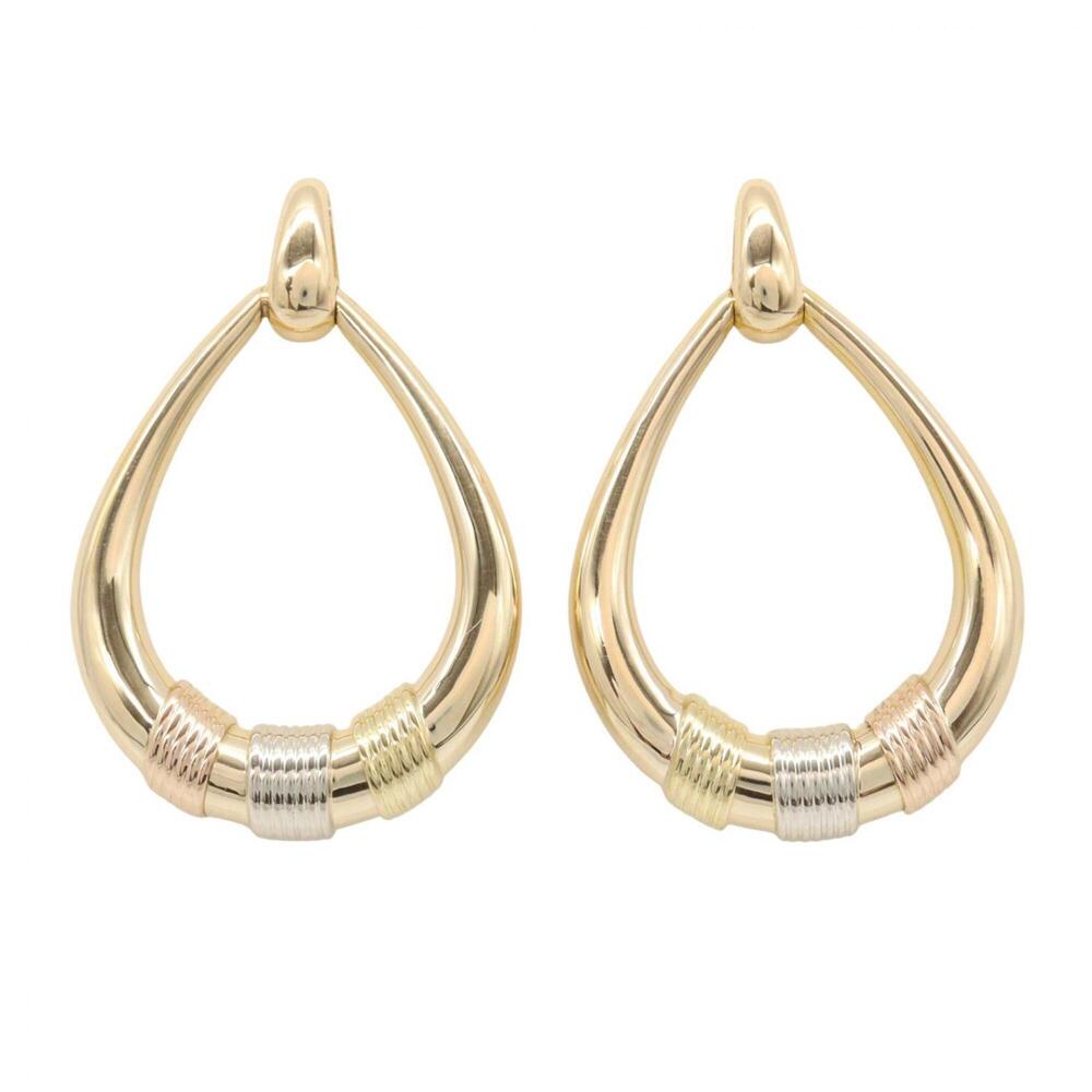 Cartier door knocker motif earrings. Jewelry available in 18K (yellow gold), ...
